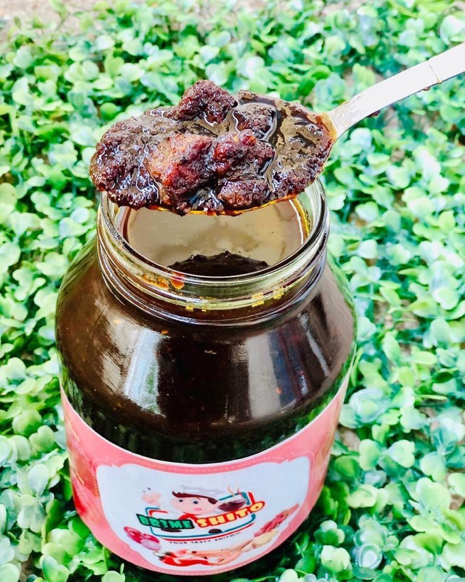 Opened jar of BrƐme Shito showing the authentic black pepper sauce